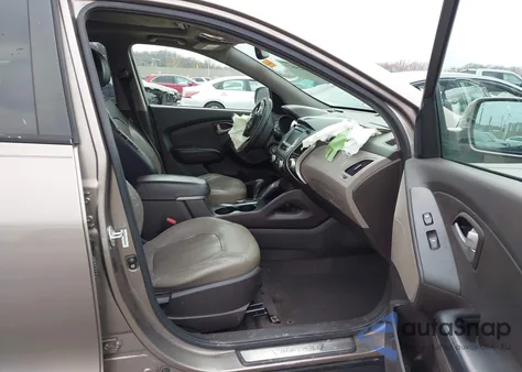 2011 Hyundai Tucson Limited z USA, uszkodzony, nr VIN KM8JU3AC6BU222620